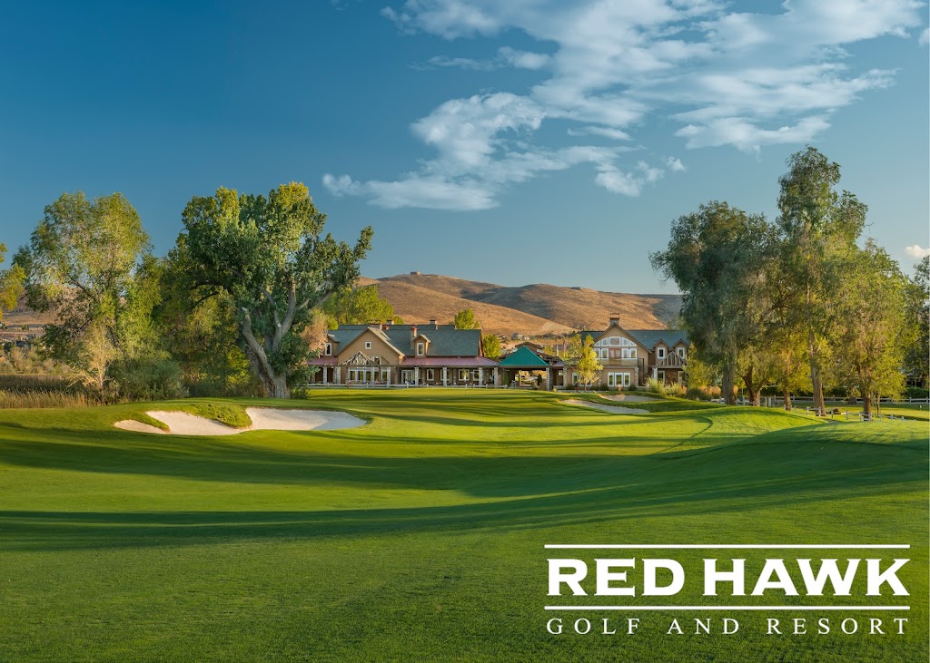 Panoramic view of a lush green golf course at Red Hawk Golf and Resort. Smooth