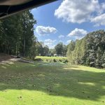 Panoramic view of a lush green golf course at Reunion Country Club. Smooth