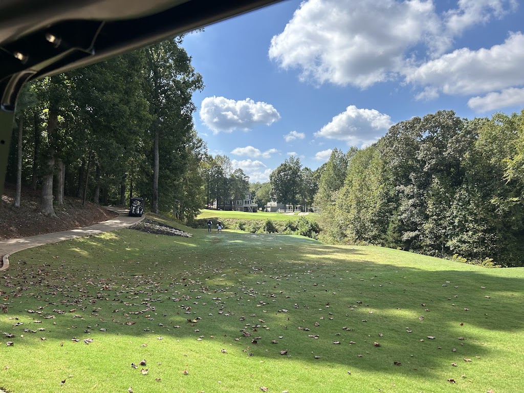 Panoramic view of a lush green golf course at Reunion Country Club. Smooth