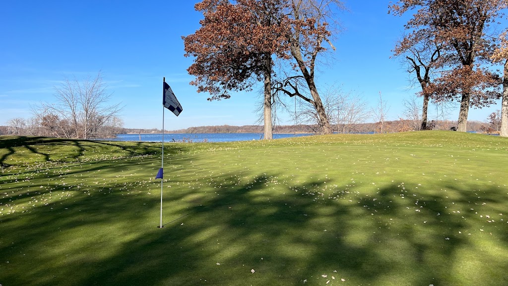 Panoramic view of a lush green golf course at Rice Lake Golf and Country Club. Smooth