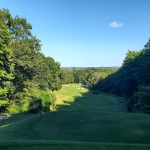 Panoramic view of a lush green golf course at Richter Park Golf Course. Smooth