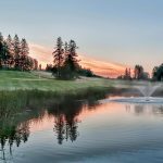 Panoramic view of a lush green golf course at Ridgeview Country Club. Smooth