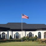 Panoramic view of a lush green golf course at Ridgeway Country Club. Smooth