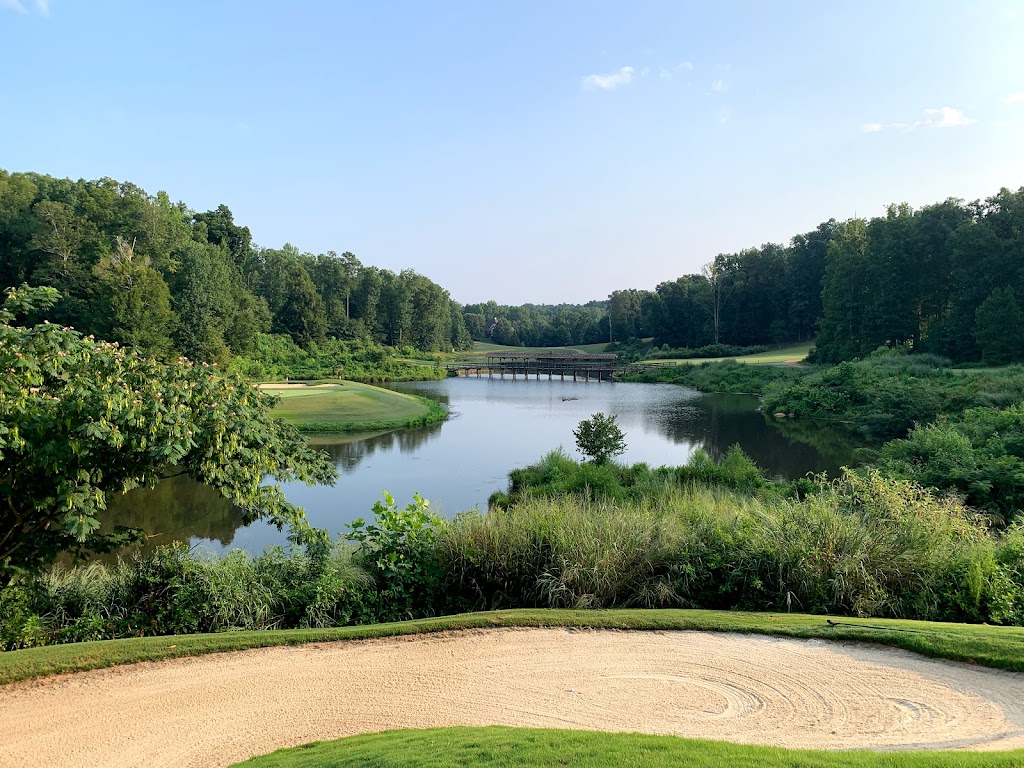 Panoramic view of a lush green golf course at River Forest Golf Club. Smooth