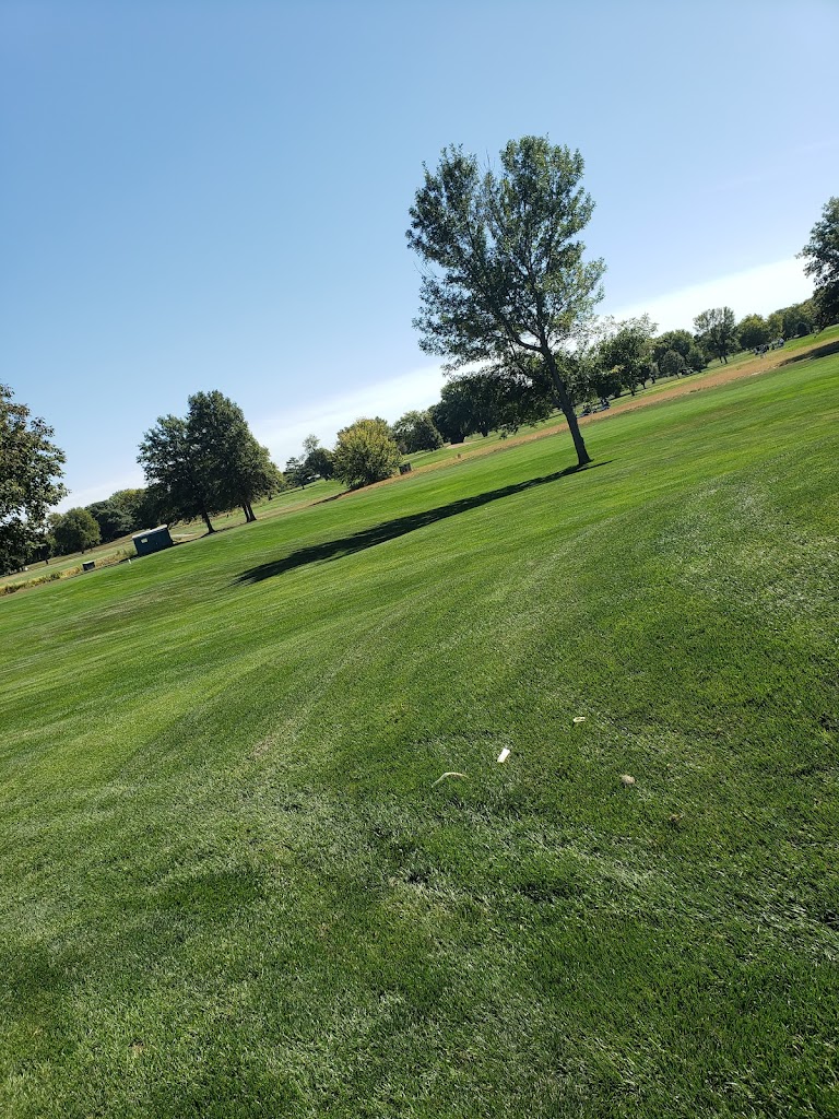 Panoramic view of a lush green golf course at River Wilds Golf Club. Smooth