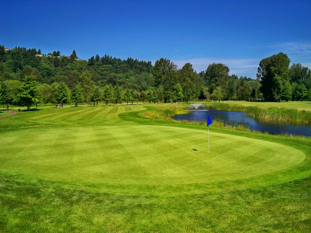 Panoramic view of a lush green golf course at Riverbend Golf Complex. Smooth