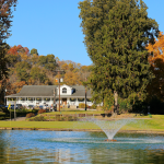Panoramic view of a lush green golf course at Riverside Golf Club WV. Smooth