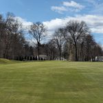 Panoramic view of a lush green golf course at Rockledge Golf Club. Smooth