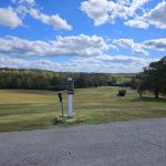 Panoramic view of a lush green golf course at Rockwood Golf & Country Club. Smooth