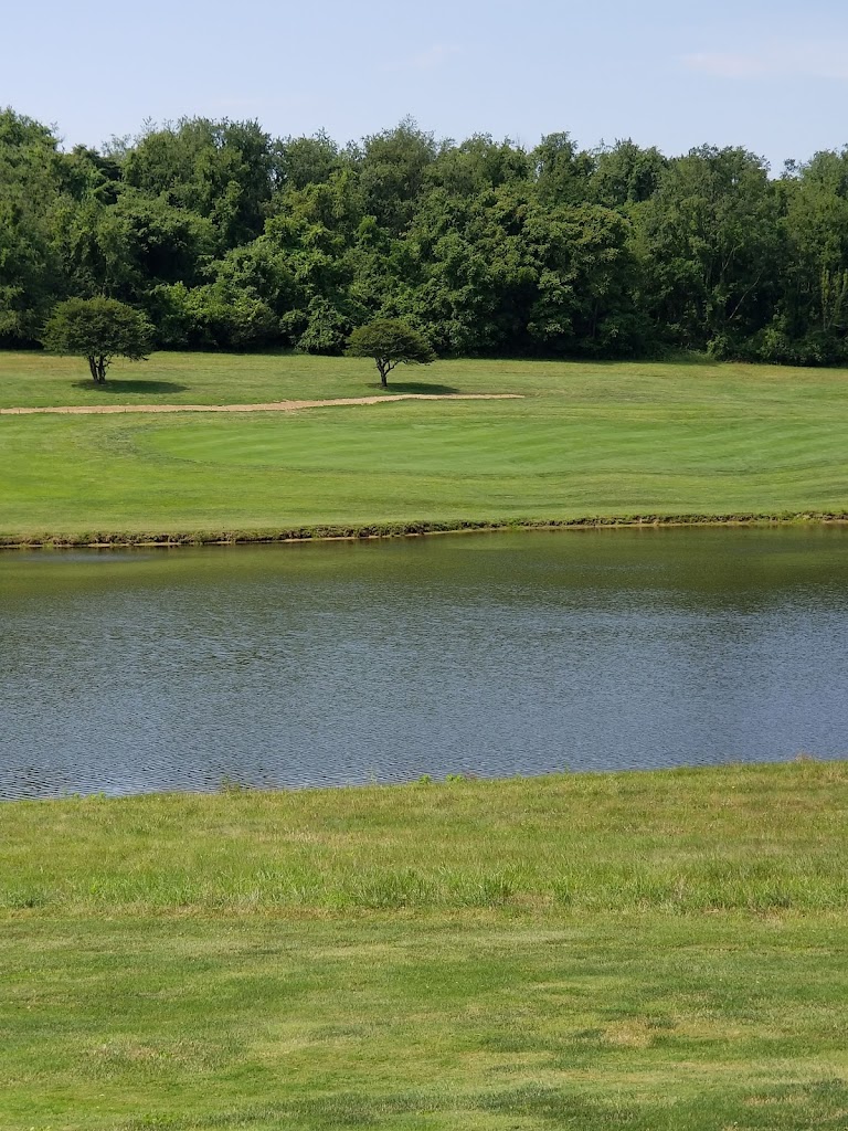 Panoramic view of a lush green golf course at Rolling Green Golf Course. Smooth