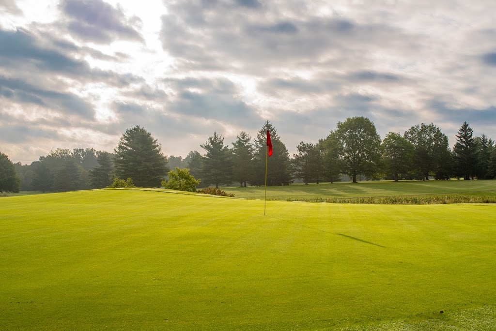 Panoramic view of a lush green golf course at Rolling Meadows Golf Course. Smooth