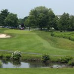 Panoramic view of a lush green golf course at Ron Jaworski's Valleybrook Country Club. Smooth