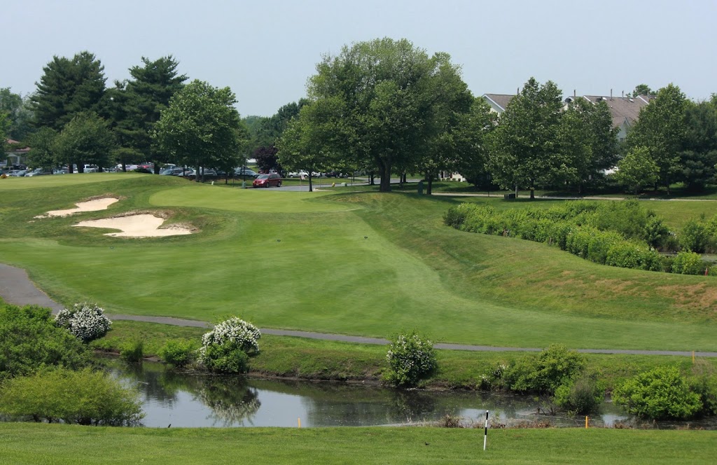 Panoramic view of a lush green golf course at Ron Jaworski's Valleybrook Country Club. Smooth
