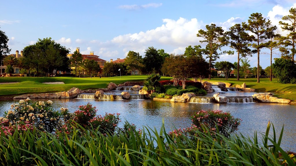 Panoramic view of a lush green golf course at Royal Oaks Country Club. Smooth