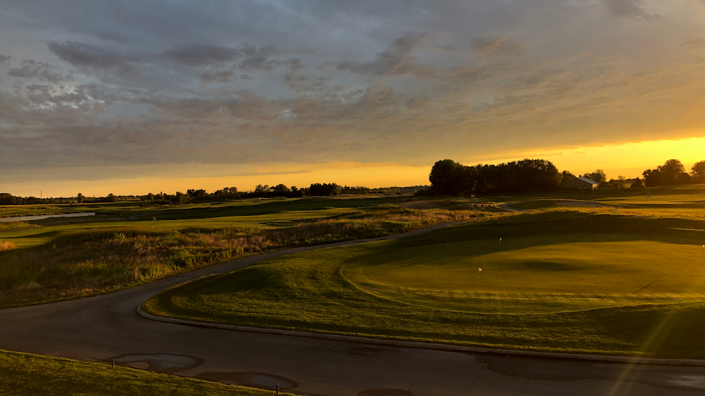 Panoramic view of a lush green golf course at Royal St. Patrick's Golf Links. Smooth