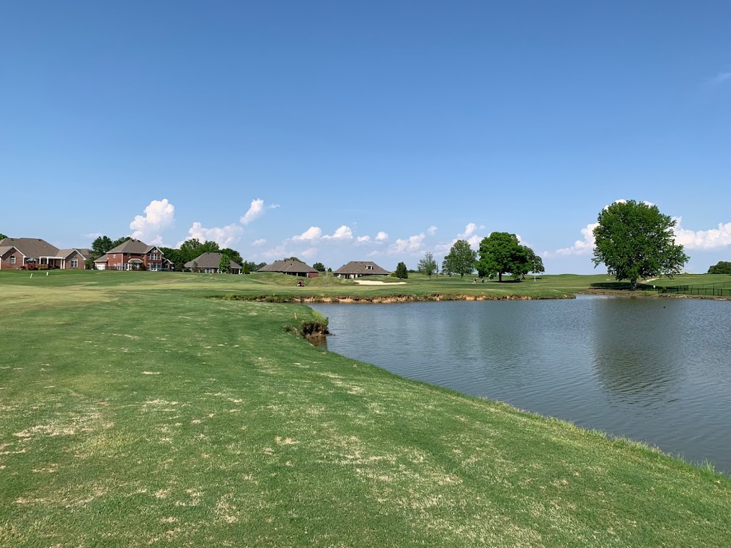 Panoramic view of a lush green golf course at Sage Meadows Country Club. Smooth