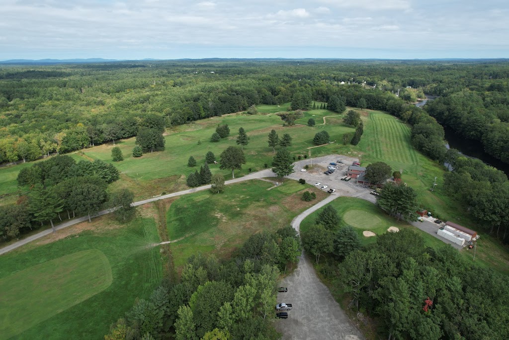 Panoramic view of a lush green golf course at Salmon Falls Country Club. Smooth