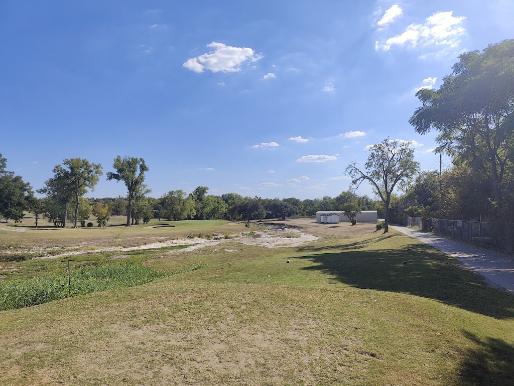 Panoramic view of a lush green golf course at Sammons Golf Course. Smooth