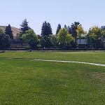 Panoramic view of a lush green golf course at San Ramon Golf Club. Smooth