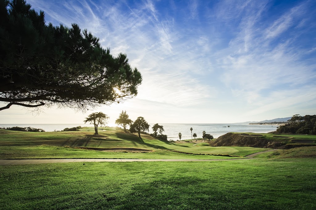 Panoramic view of a lush green golf course at Sandpiper Golf Club. Smooth