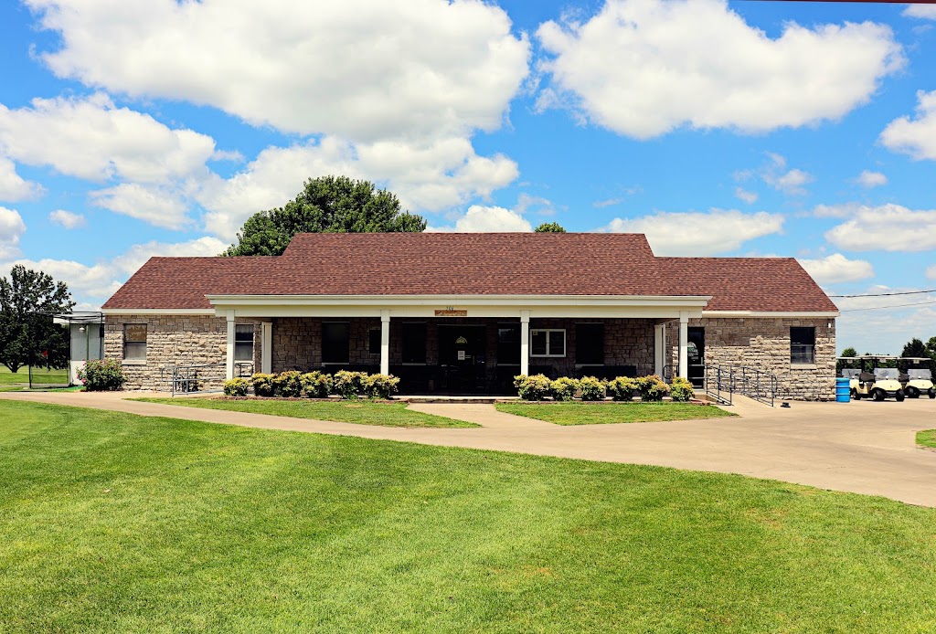 Panoramic view of a lush green golf course at Schifferdecker Golf Course. Smooth