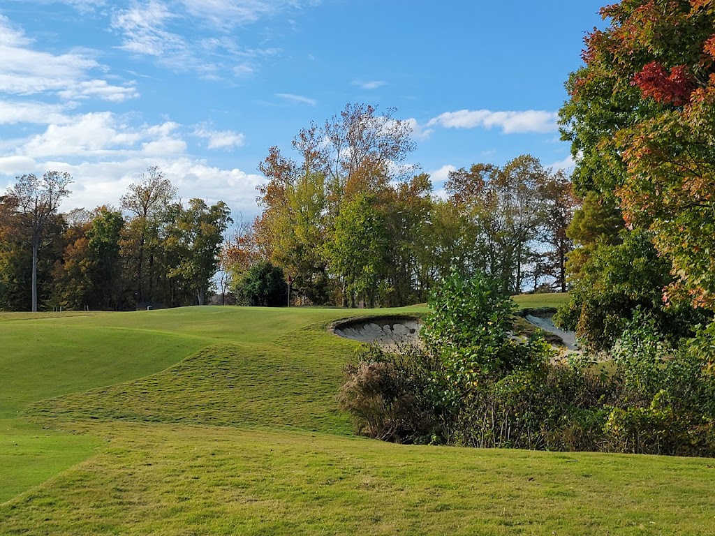 Panoramic view of a lush green golf course at Scotch Hall Golf Shop. Smooth