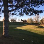 Panoramic view of a lush green golf course at Scotch Pines Golf Course. Smooth