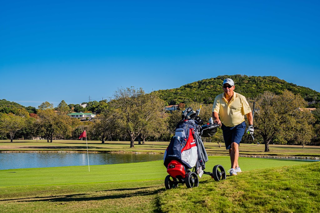 Panoramic view of a lush green golf course at Scott Schreiner Municipal Golf Course. Smooth