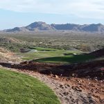 green grass with the flag in the hole.
