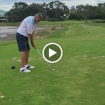 green grass with the flag in the hole.