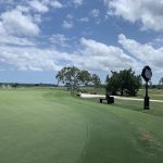 Panoramic view of a lush green golf course at Secession Golf Club. Smooth