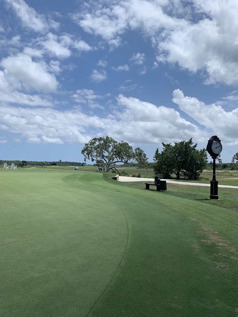 Panoramic view of a lush green golf course at Secession Golf Club. Smooth