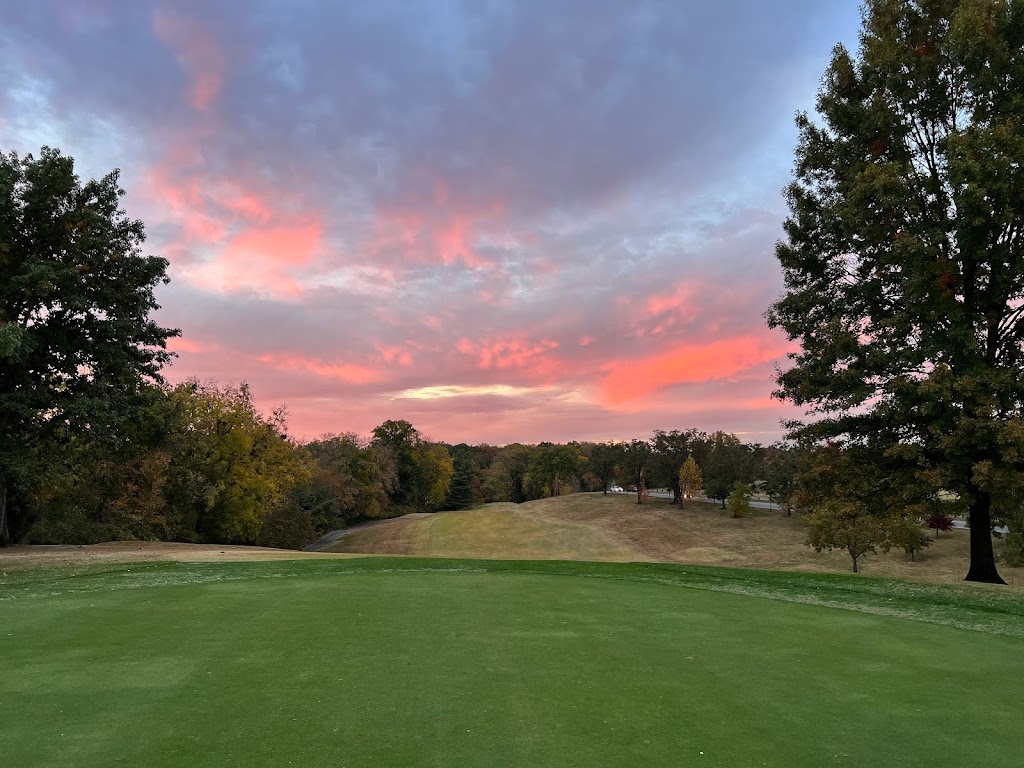 Panoramic view of a lush green golf course at Seneca Golf Course. Smooth