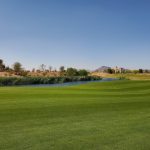 Panoramic view of a lush green golf course at Sewailo Golf Club. Smooth