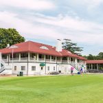 Panoramic view of a lush green golf course at Sewells Point Golf Course. Smooth