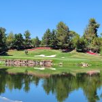 Panoramic view of a lush green golf course at Shadow Creek Golf Course. Smooth