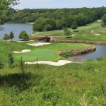 Panoramic view of a lush green golf course at Shadow Glen Golf Club. Smooth