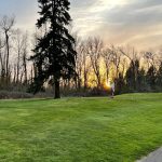Panoramic view of a lush green golf course at Shadow Hills Country Club. Smooth