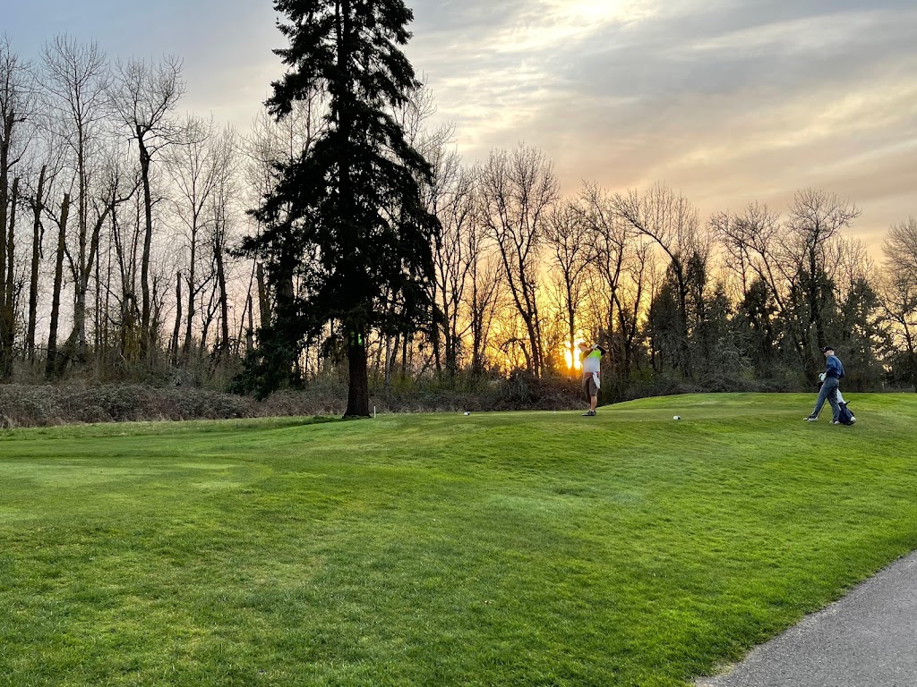 Panoramic view of a lush green golf course at Shadow Hills Country Club. Smooth
