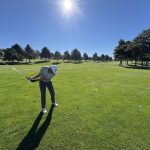 green grass with the flag in the hole.