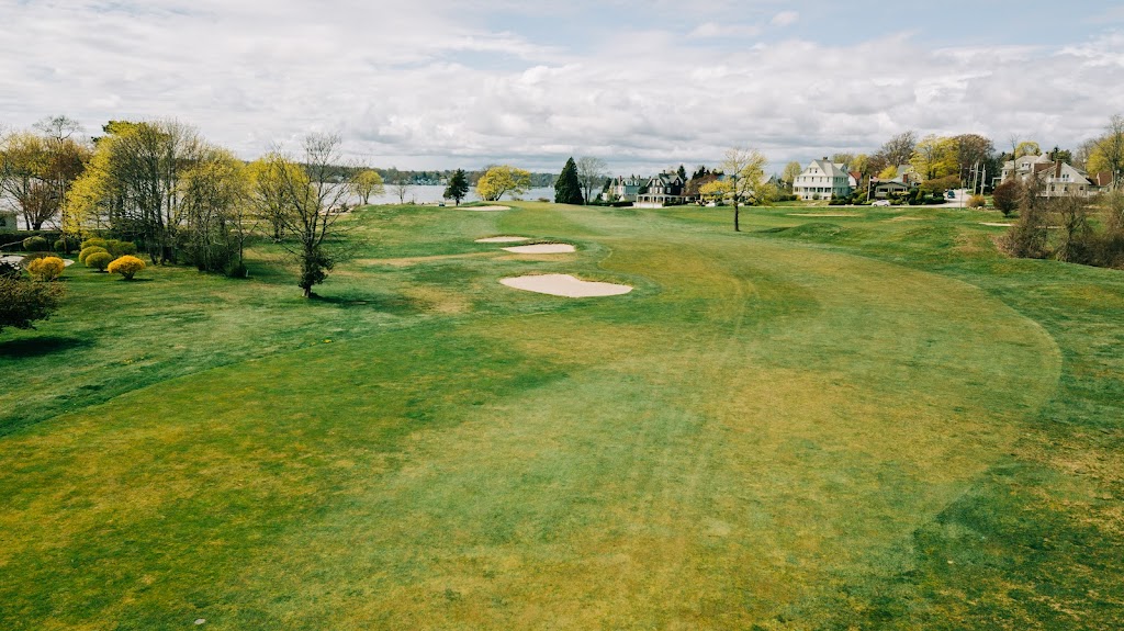 Panoramic view of a lush green golf course at Shennecossett Golf Course. Smooth