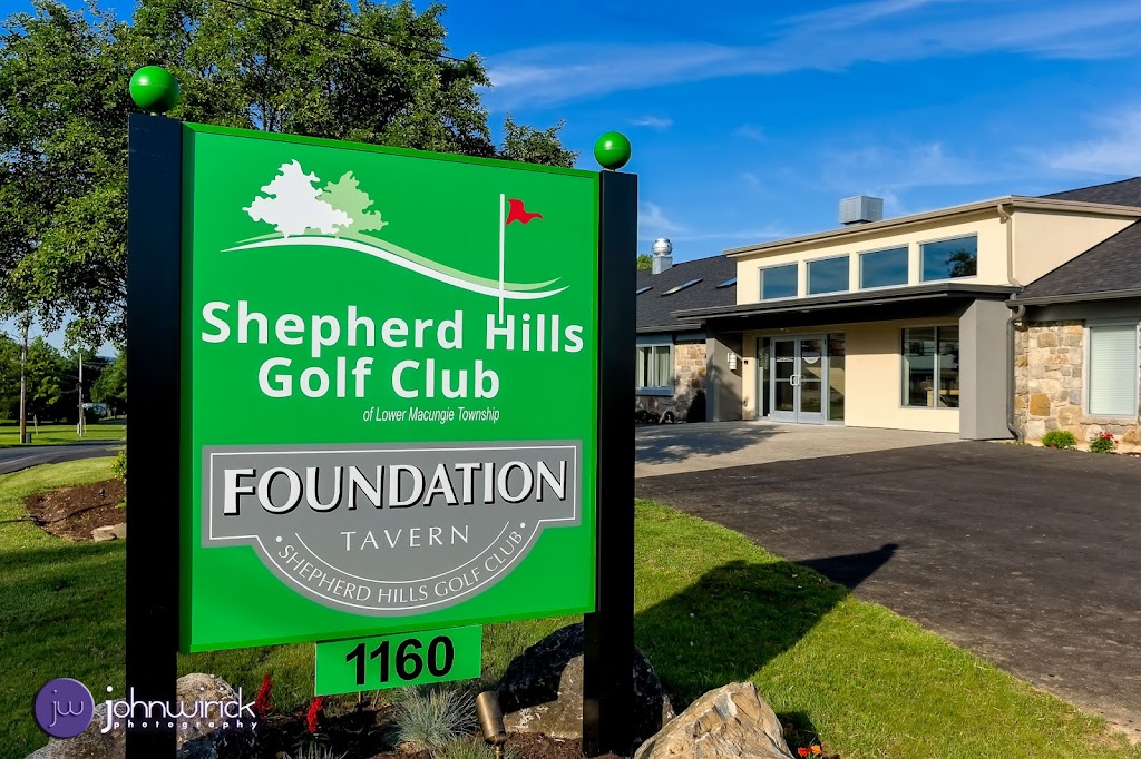Panoramic view of a lush green golf course at Shepherd Hills Golf Club. Smooth