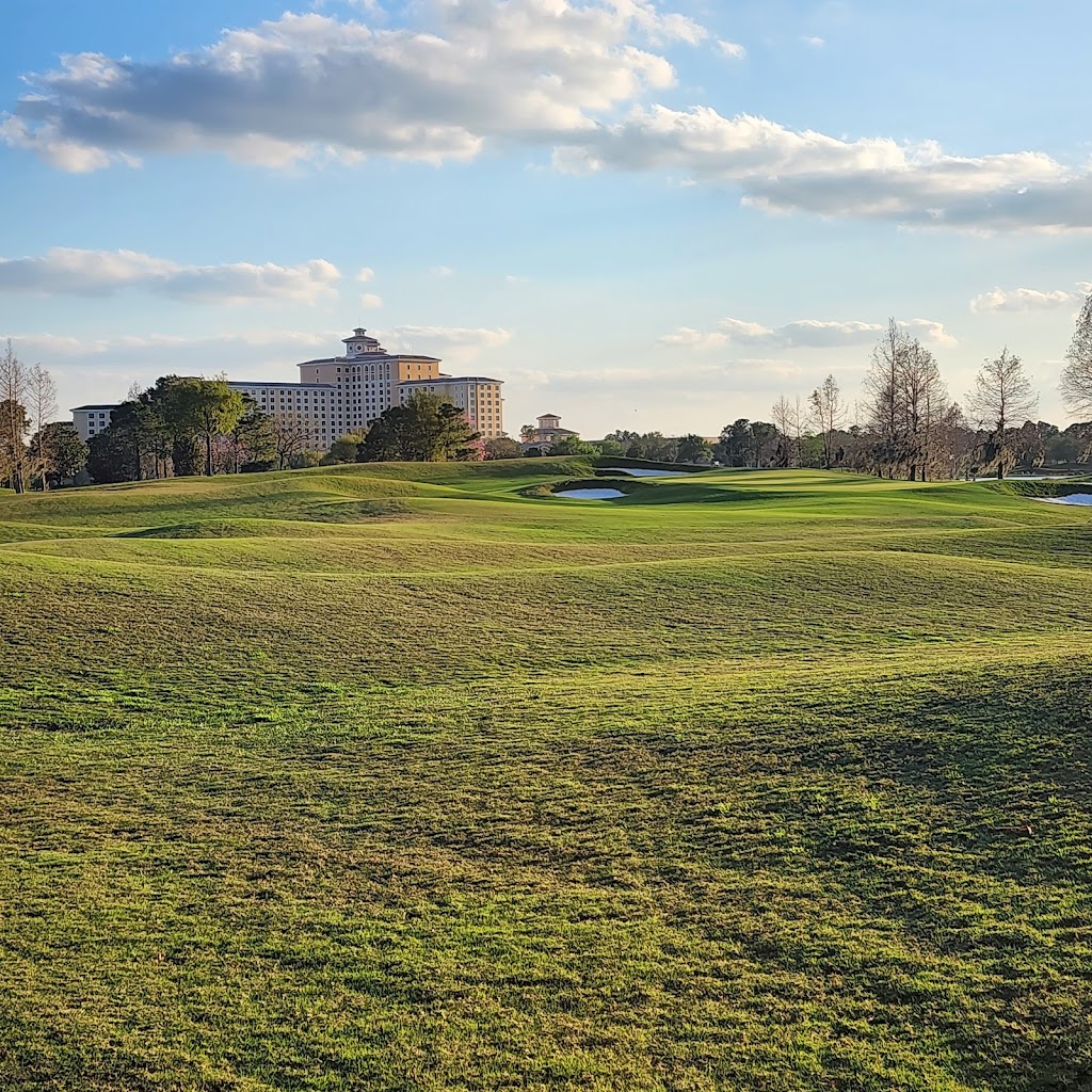 Panoramic view of a lush green golf course at Shingle Creek Golf Club. Smooth