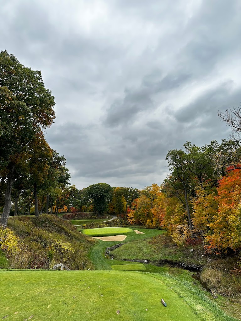 Panoramic view of a lush green golf course at Shoreacres. Smooth