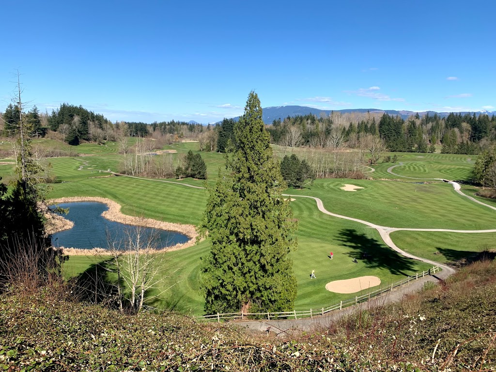 Panoramic view of a lush green golf course at Shuksan Golf Club. Smooth