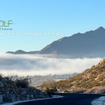 Panoramic view of a lush green golf course at Sierra Del Rio Golf Course at Turtleback Mountain Resort. Smooth