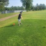 Panoramic view of a lush green golf course at Siloam Springs Golf Club. Smooth