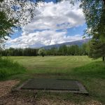 Panoramic view of a lush green golf course at Sleepy Hollow Golf. Smooth