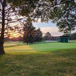 Panoramic view of a lush green golf course at Sleepy Hollow Golf Course. Smooth