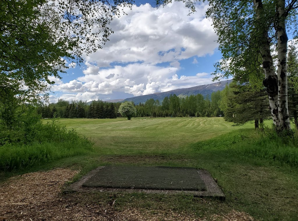 Panoramic view of a lush green golf course at Sleepy Hollow Golf. Smooth